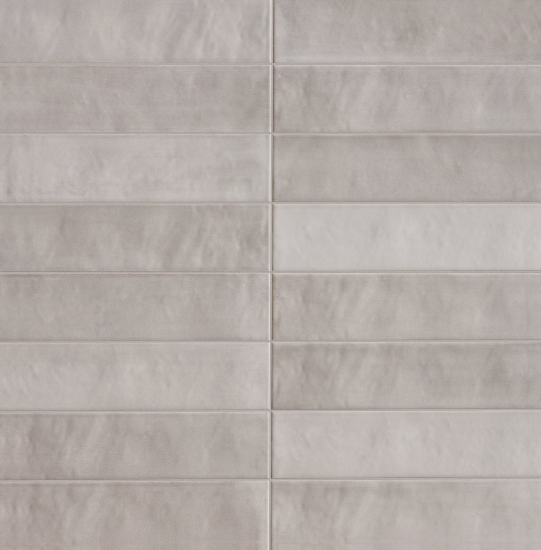 Surface view of Passaggi Grey 2x9 Matte Porcelain Tile with cool gray tones, sleek linear form, and matte finish suited for minimalist or contemporary interiors.