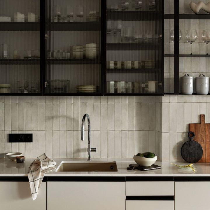 Interior with Passaggi Grey 2x9 Matte Porcelain Tile, highlighting a cool, neutral palette and a contemporary matte finish for versatile design.