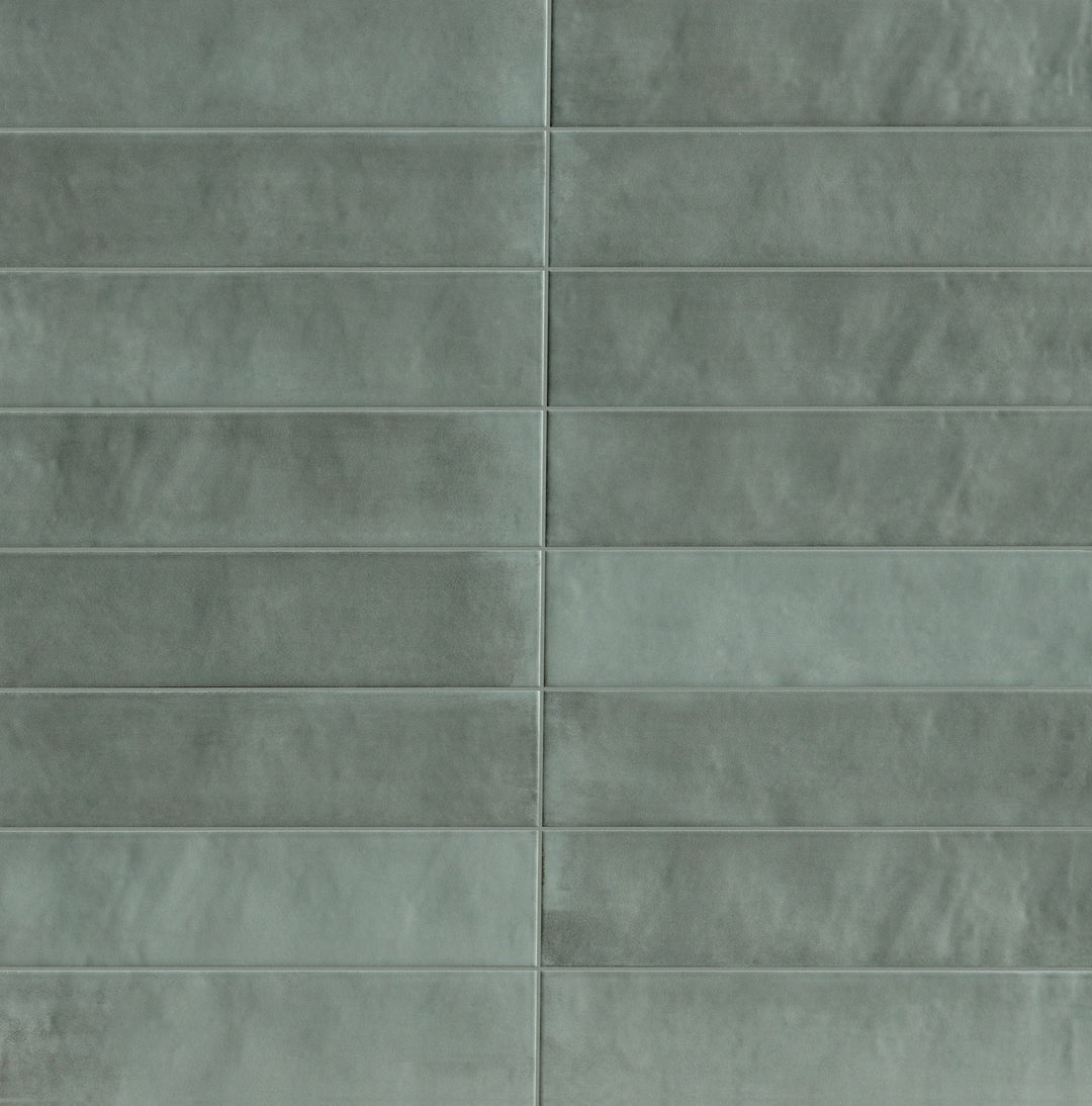 Full view of Passaggi Green 2x9 Matte Porcelain Tile featuring light sage green color, elongated porcelain shape, and matte finish for calm, nature-inspired interiors.