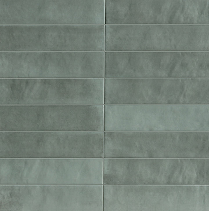 Full view of Passaggi Green 2x9 Matte Porcelain Tile featuring light sage green color, elongated porcelain shape, and matte finish for calm, nature-inspired interiors.