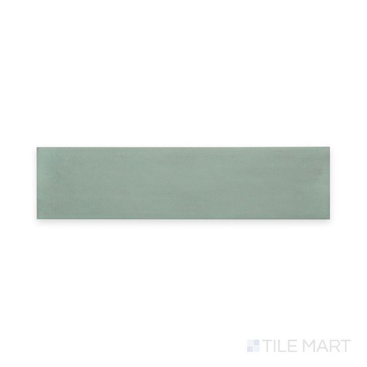 Straight-overhead angle of Passaggi Green 2x9 Matte Porcelain, showcasing tranquil green tones in a slim profile ideal for nature-inspired designs and spa-like environments.