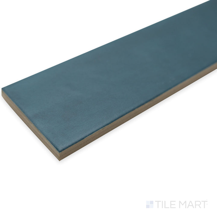 Angled detail of Passaggi Blue 2x9 porcelain tile presenting its rich navy tones in a contemporary layout.