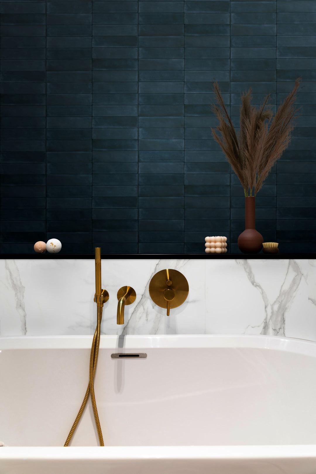 Room designed with Passaggi Blue 2x9 Matte Porcelain Tile, delivering cool blue tones and a modern rectangular profile that complements tranquil, stylish interiors.
