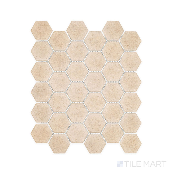 Flat-lay view of Richmond Taupe 2" Hexagon Matte Porcelain Mosaic, highlighting the warm taupe hue and modern hex pattern ideal for accent walls or flooring in high-traffic areas.