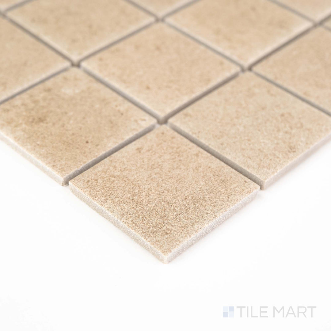 Corner shot of Richmond Taupe 2" Square Matte Porcelain Mosaic showcasing earthy taupe hues in a clean square grid – perfect for understated, contemporary interiors.