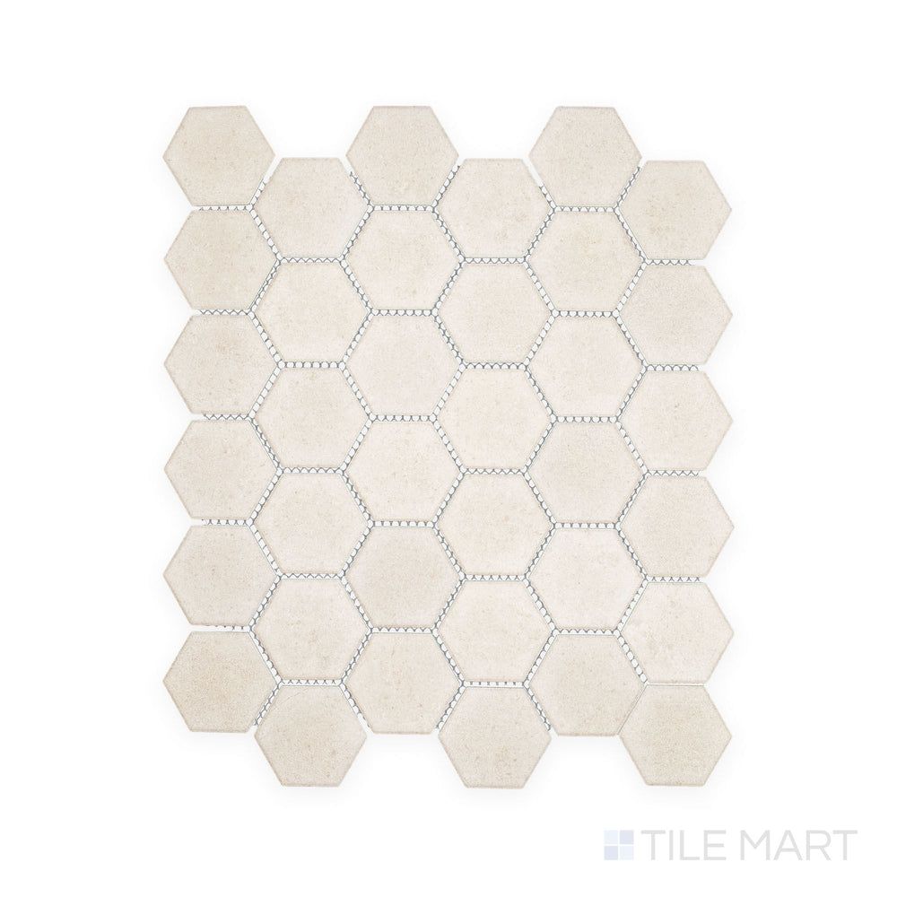 Overhead snapshot of Richmond Ivory 2" Hexagon Matte Porcelain Mosaic, featuring soft ivory shades and geometric detail to enhance backsplashes and bathroom floors.