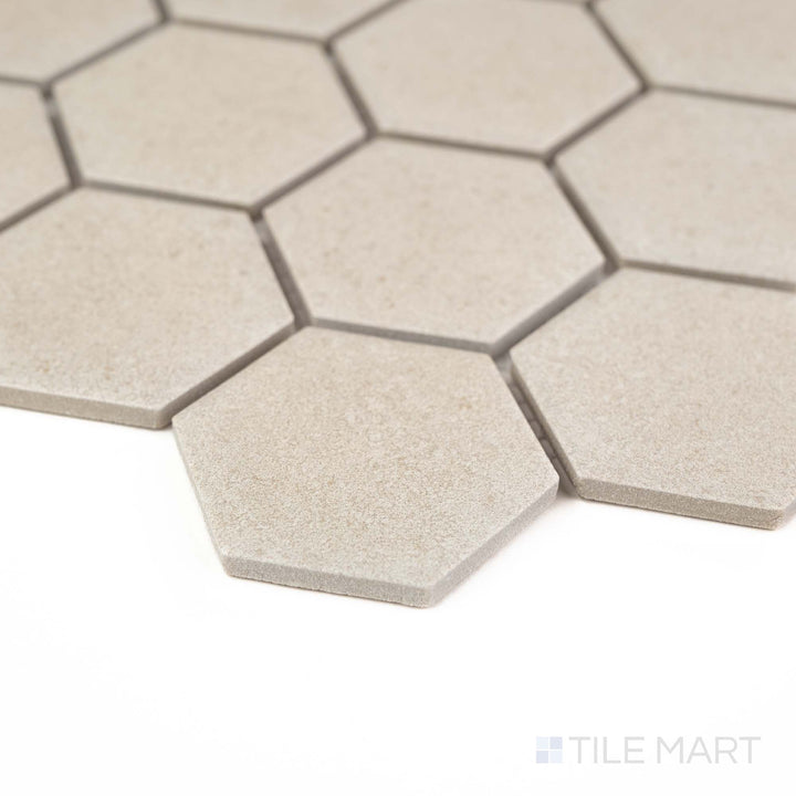 Corner angle of Richmond Ivory 2" Hexagon Matte Porcelain Mosaic with soft ivory shades and geometric hex design – great for vintage, modern, or transitional décor.