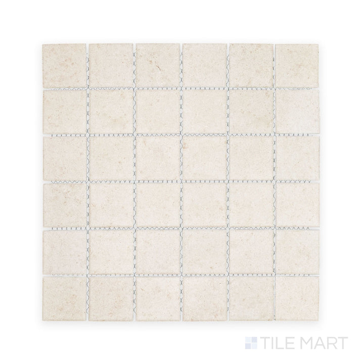 Tile shot from above showing Richmond Ivory 2" Square Matte Porcelain Mosaic, a neutral and adaptable surface choice for serene, spa-like environments.
