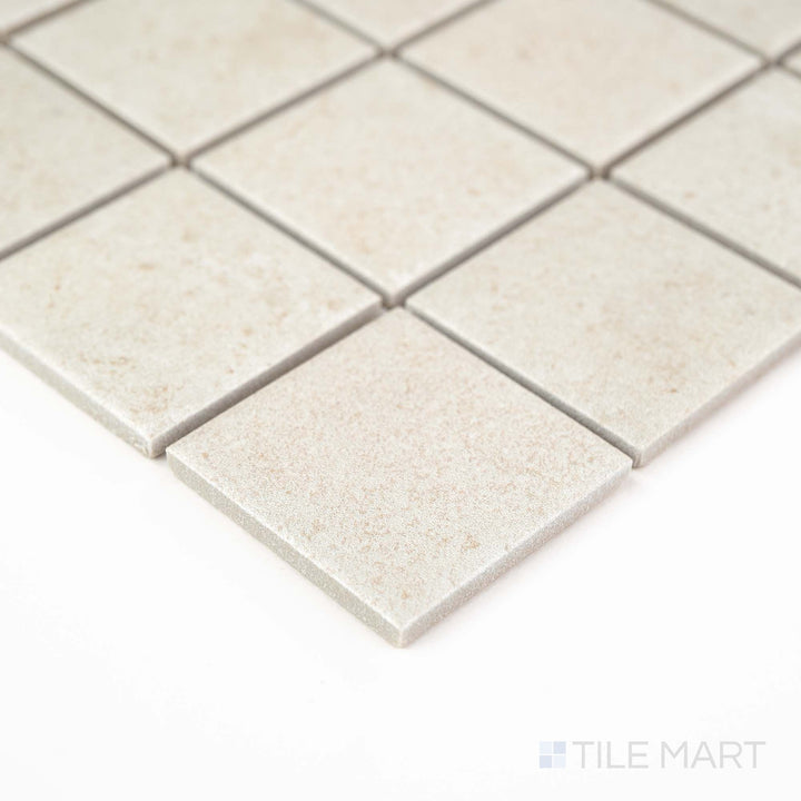 Corner detail of Richmond Ivory 2" Square Matte Porcelain Mosaic highlighting its creamy white tone and traditional square layout – ideal for timeless bathroom or kitchen applications.