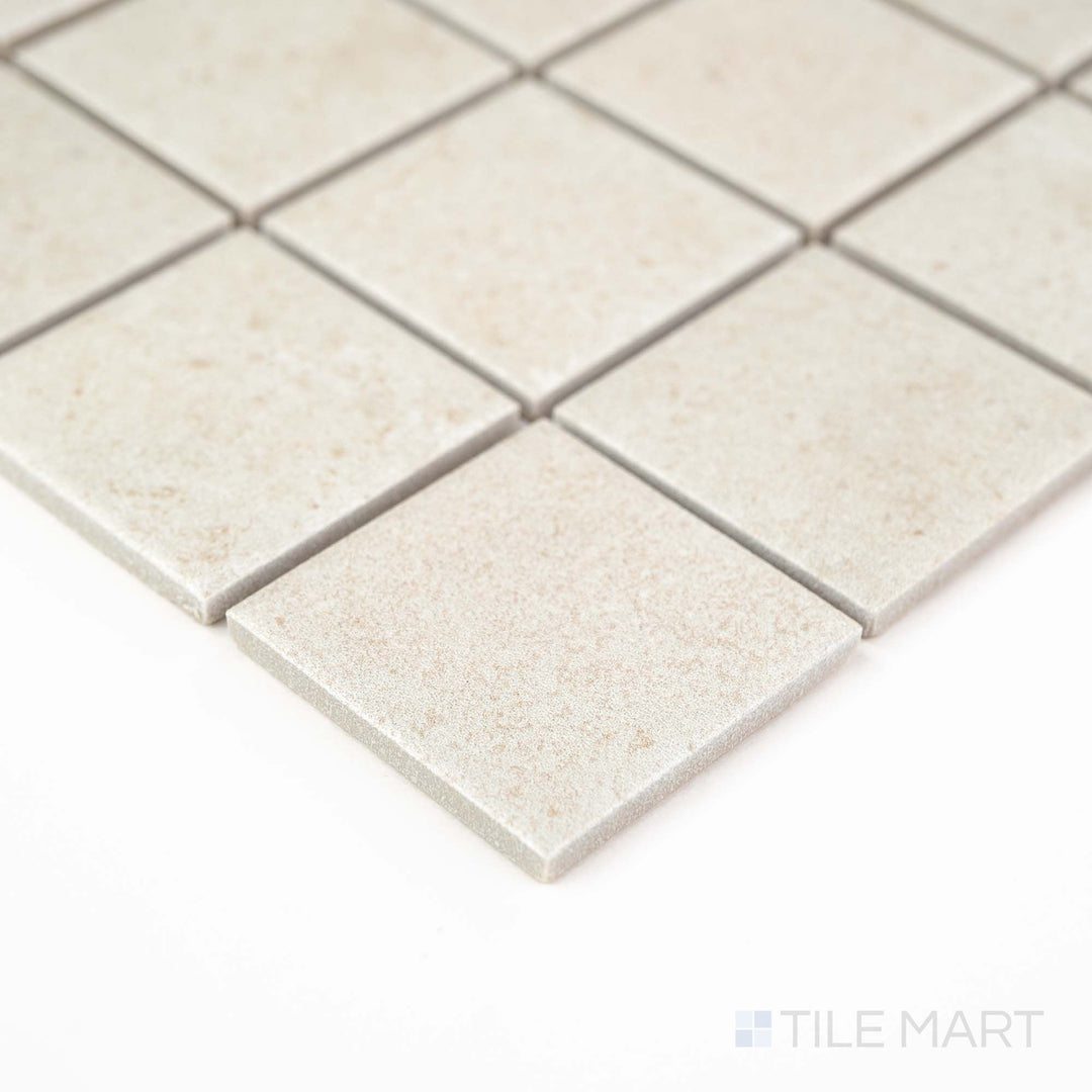 Corner detail of Richmond Ivory 2" Square Matte Porcelain Mosaic highlighting its creamy white tone and traditional square layout – ideal for timeless bathroom or kitchen applications.
