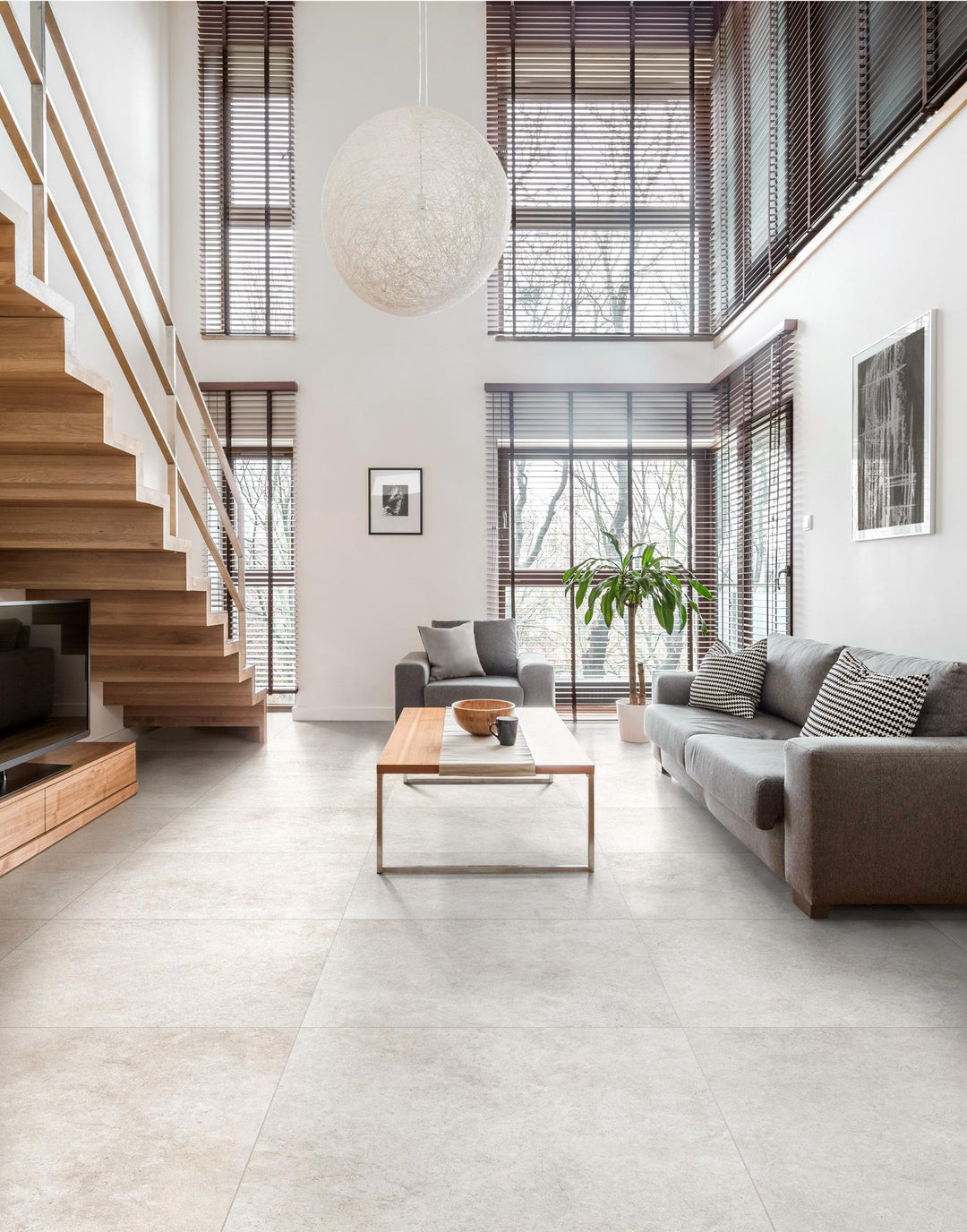 Richmond Ivory 39x39 Matte Porcelain Tile styled in a neutral-toned room, showcasing its large square format and soft ivory tones for a clean, modern base.