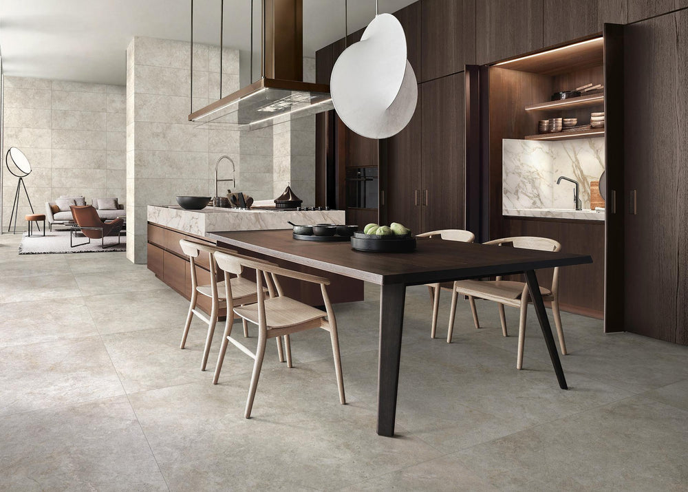 Space finished with Richmond Taupe 39x39 Matte Porcelain Tile, highlighting its warm taupe color and spacious layout for a timeless, grounded look.