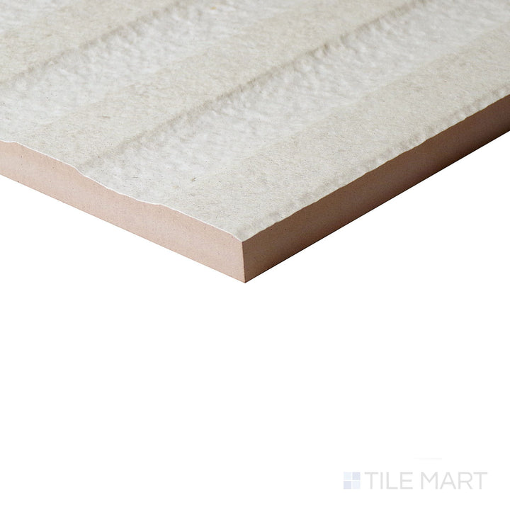 Angled detail of Richmond Struttura 3D Ivory ceramic tile highlighting subtle raised patterns and a soft ivory hue.