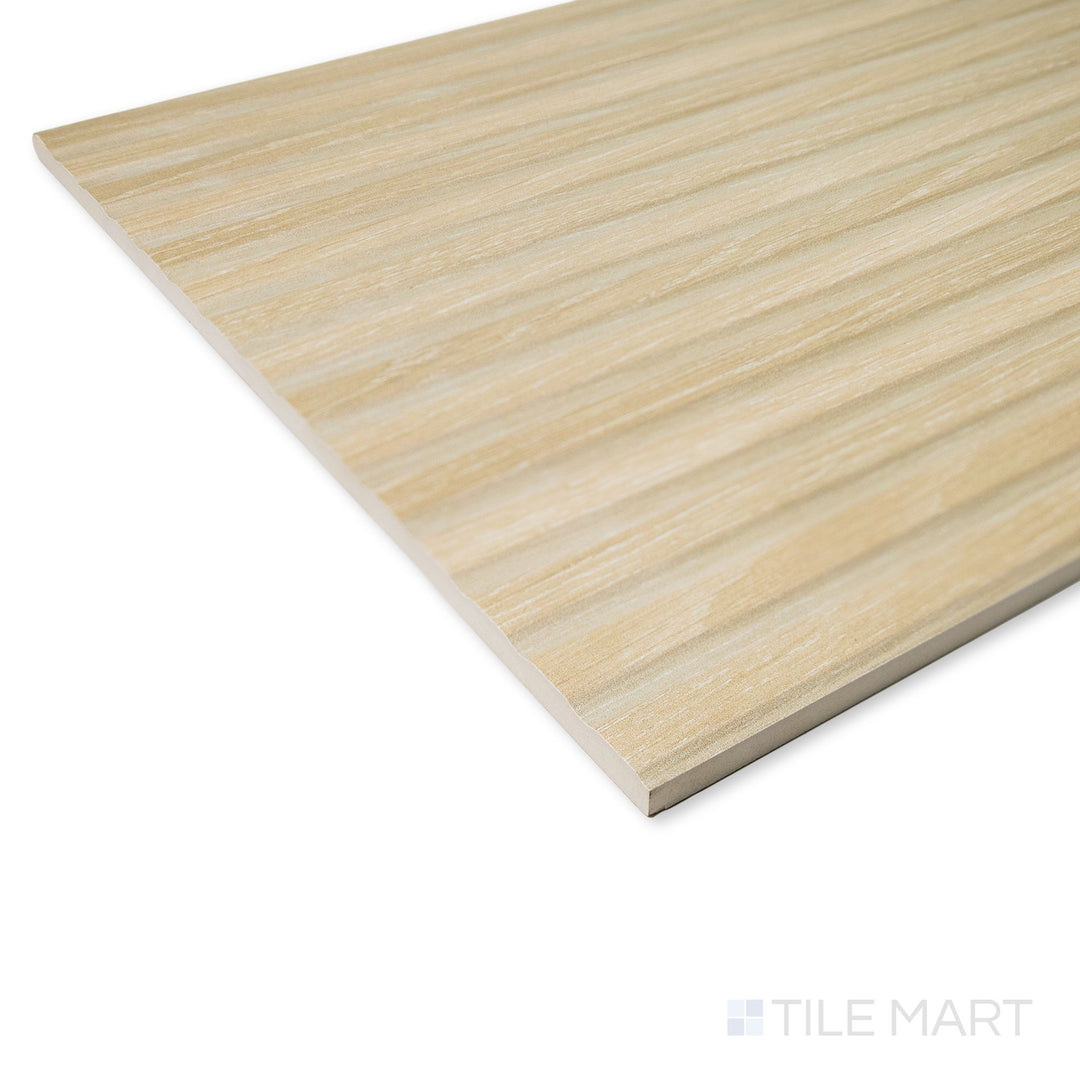 Corner view of Valkiria Esir Deco Oak tile presenting its warm woodgrain texture and decorative ceramic detailing.