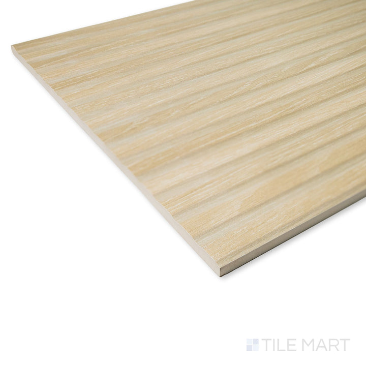 Corner view of Valkiria Esir Deco Oak tile presenting its warm woodgrain texture and decorative ceramic detailing.