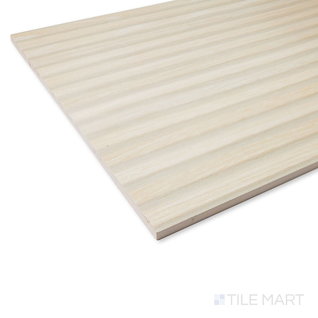 Angled shot of Valkiria Esir Deco Maple ceramic tile emphasizing its soft maple tones and intricate surface design.