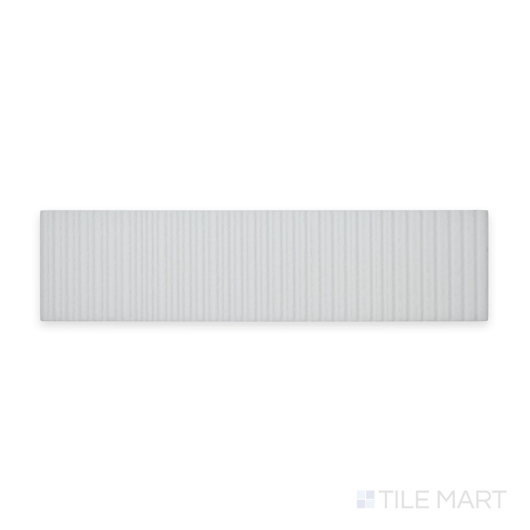 Tile presented in a skyward perspective: Van Decor Blanco 3X12 Matte Ceramic, with subtle relief detailing and a soft white hue for textured contrast.