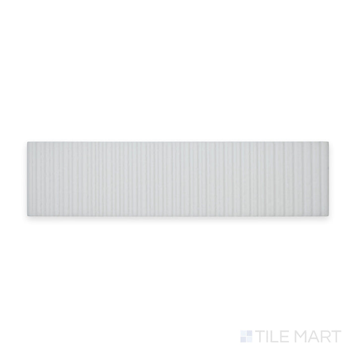 Tile presented in a skyward perspective: Van Decor Blanco 3X12 Matte Ceramic, with subtle relief detailing and a soft white hue for textured contrast.