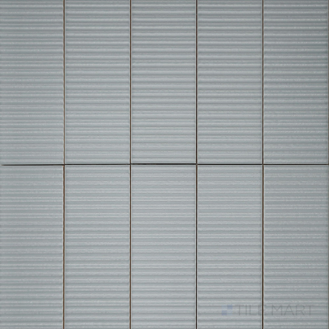 Overview of Van Decor Oliva 3x12 Matte Ceramic Tile with earthy olive color, decorative detailing, and smooth matte finish ideal for creative installations.