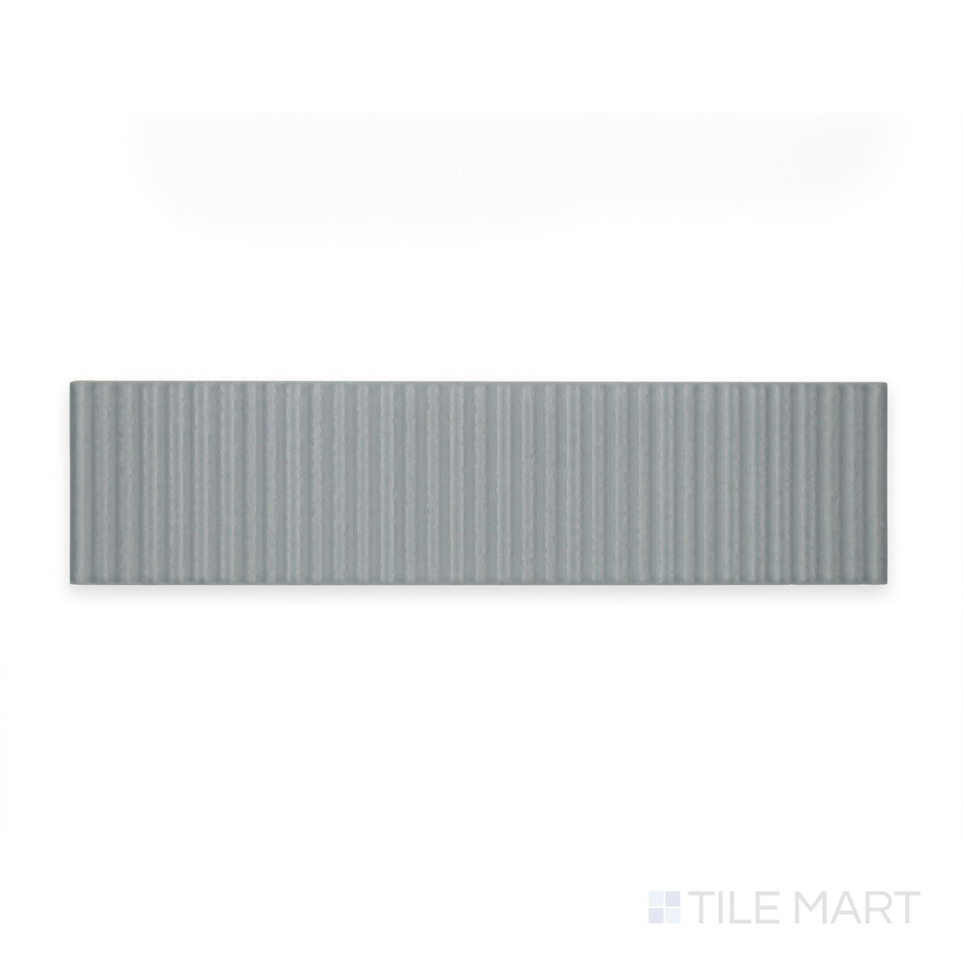 View from directly above: Van Decor Oliva 3X12 Matte Ceramic, showcasing sculpted designs on a warm olive canvas—great for decorative wall borders.