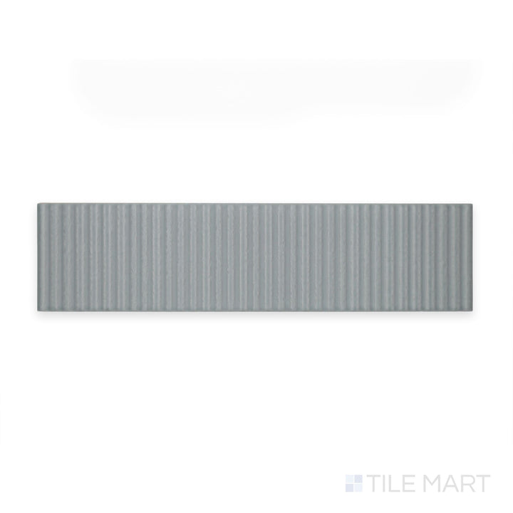 View from directly above: Van Decor Oliva 3X12 Matte Ceramic, showcasing sculpted designs on a warm olive canvas—great for decorative wall borders.