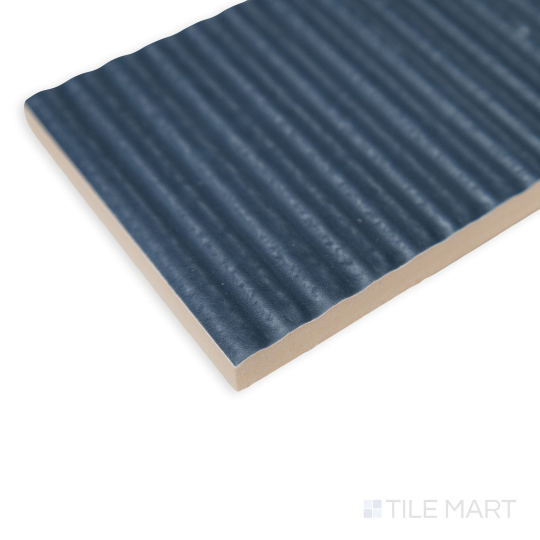 Corner view of Van Decor Azul tile emphasizing its deep blue tone and expressive surface patterning.