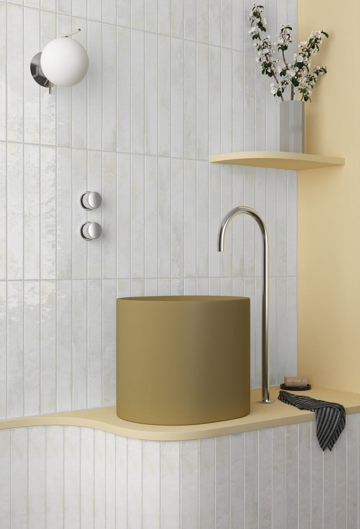 A soft glow radiates off the glossy finish, giving Bali White a fresh, light-amplifying character indoors.