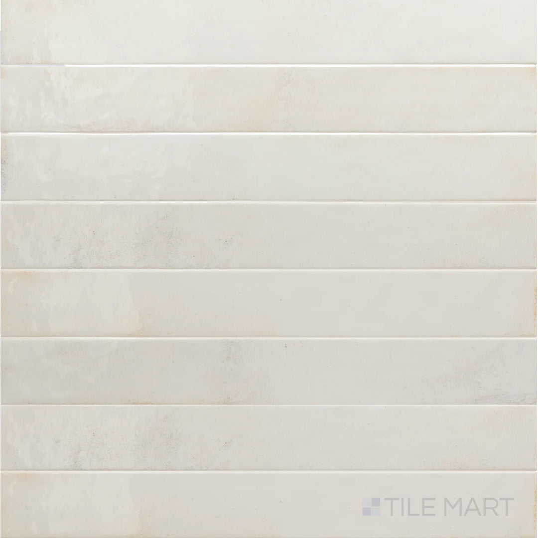 Overview of Bali White 2x16 glossy ceramic subway tile, assembled to show its vibrant, reflective sheen.