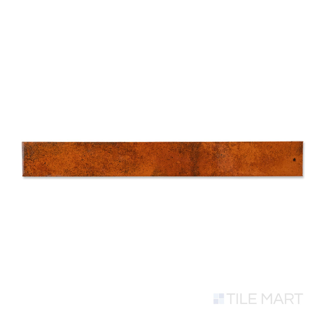 Overhead view of a single Bali Ginger tile, highlighting the glossy surface and spiced color depth.