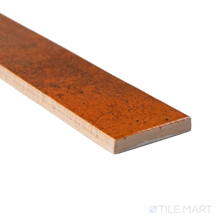 Corner shot of Bali Ginger subway tile revealing its rectified edge and light-catching glaze.