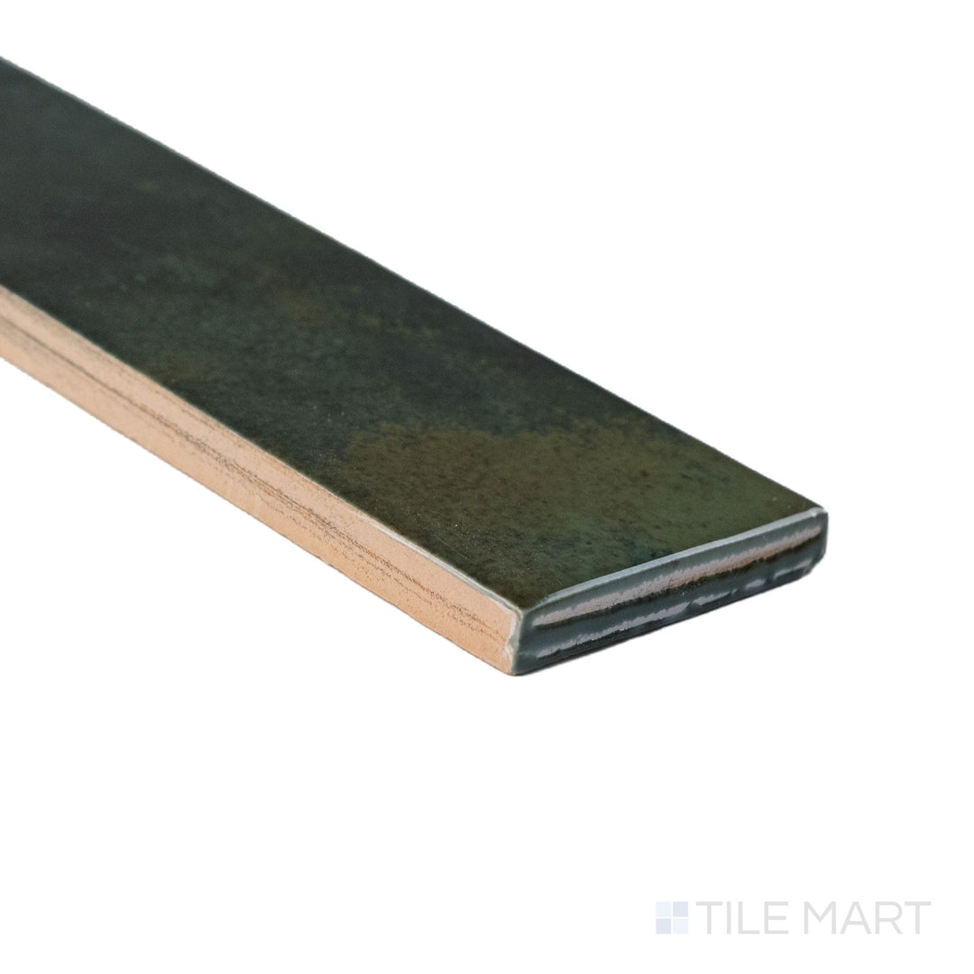 Corner shot of Bali Isle Of Pine subway tile capturing its edge profile and luminous glaze.