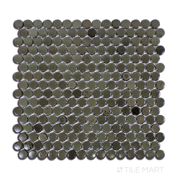 This close-up view of 360° Shale 3/4" Penny Round Matte Glazed Porcelain Mosaic tile emphasizes its rich, earthy shale tone and muted matte glaze, perfect for warm, inviting spaces.