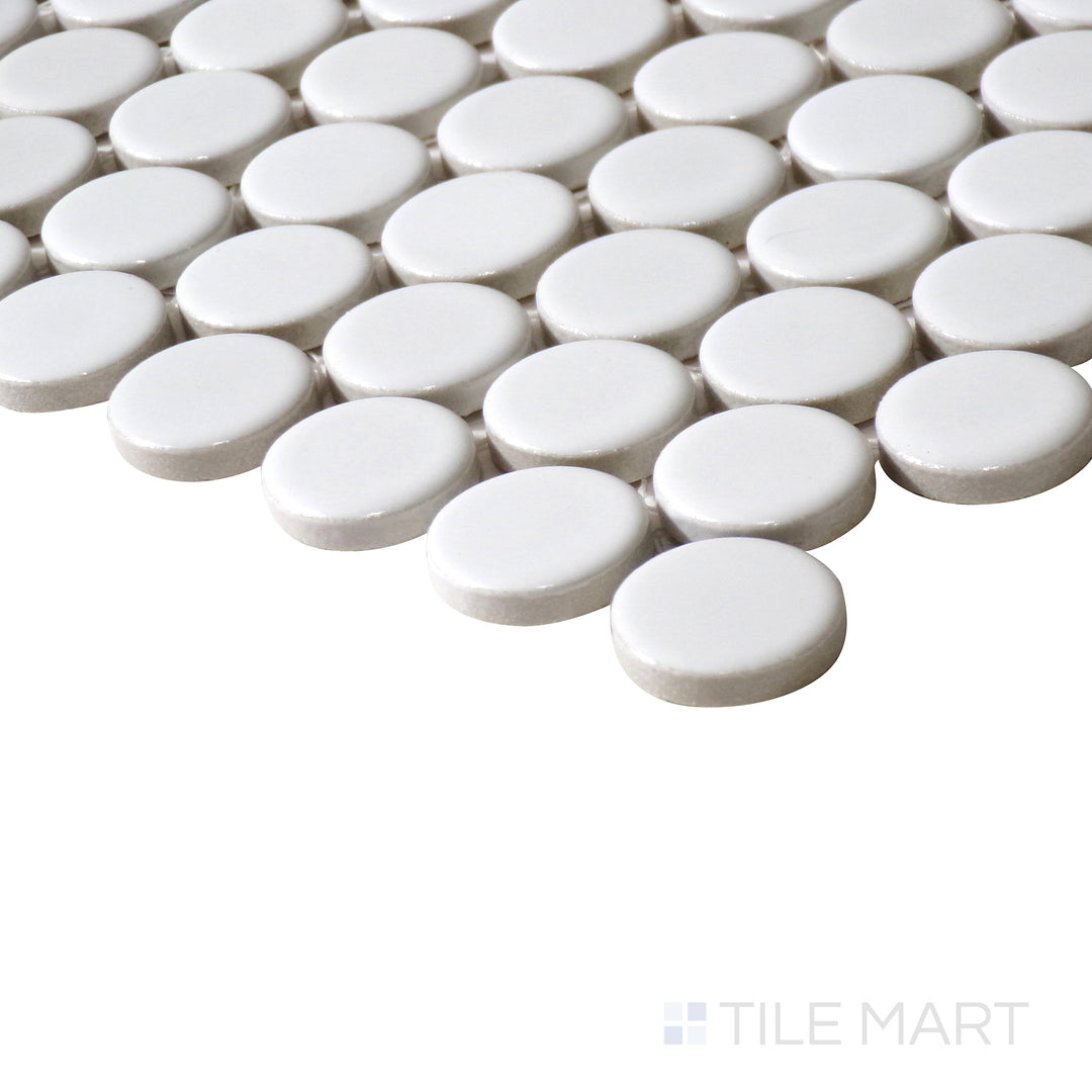 Angled shot of 360° White 3/4" penny round matte glazed porcelain mosaic, emphasizing its crisp white shade, delicate matte surface, and the clean-cut intersection where its pattern meets at the corner.