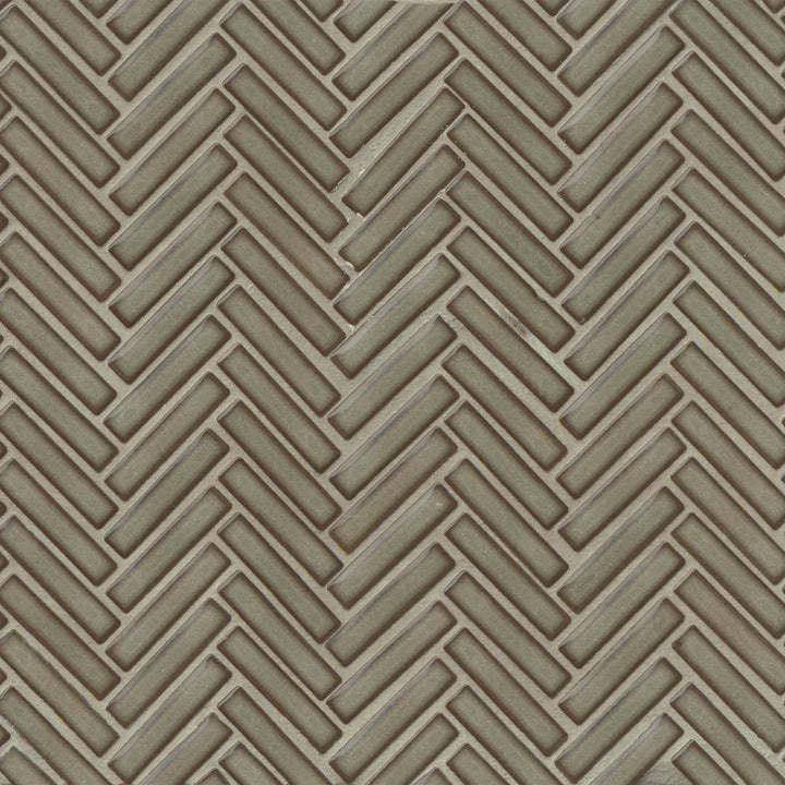 Captured from above, the 90° Gray Haze Herringbone mosaic showcases its soft gray tones and high-gloss finish, creating a refined and contemporary appeal.