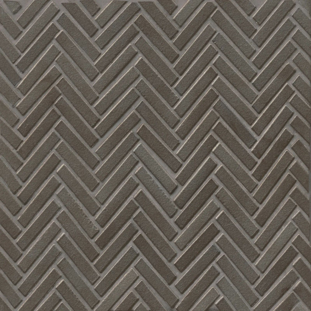 An overhead shot of the 90° Metallic Herringbone mosaic highlights its shimmering metallic glaze, arranged in a striking herringbone pattern for a sleek, modern aesthetic.