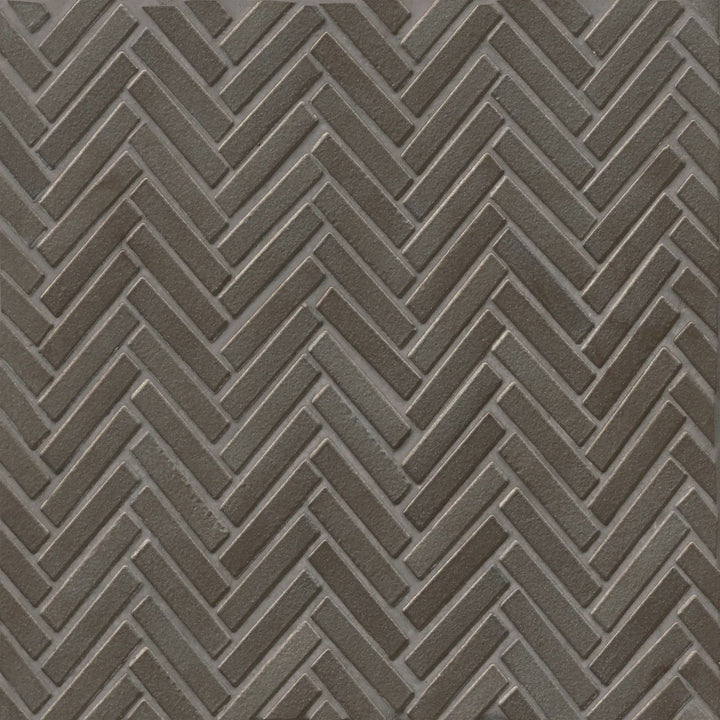 An overhead shot of the 90° Metallic Herringbone mosaic highlights its shimmering metallic glaze, arranged in a striking herringbone pattern for a sleek, modern aesthetic.