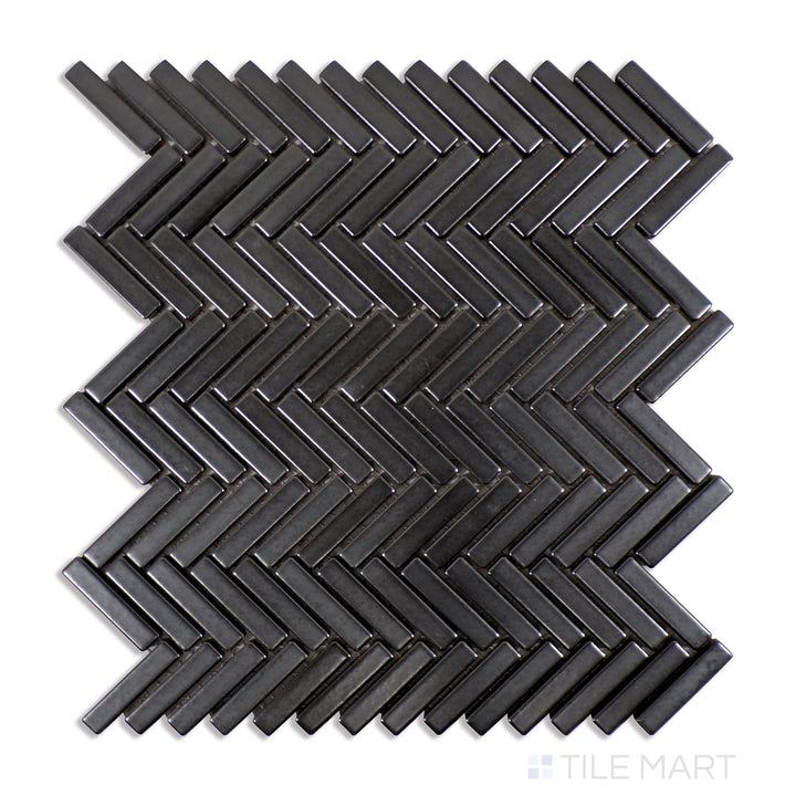 Zoomed in to capture the details, the 90° Metallic Herringbone Gloss Glazed Porcelain Mosaic tile reflects a sleek metallic sheen with its glossy glaze, adding a modern, upscale touch.