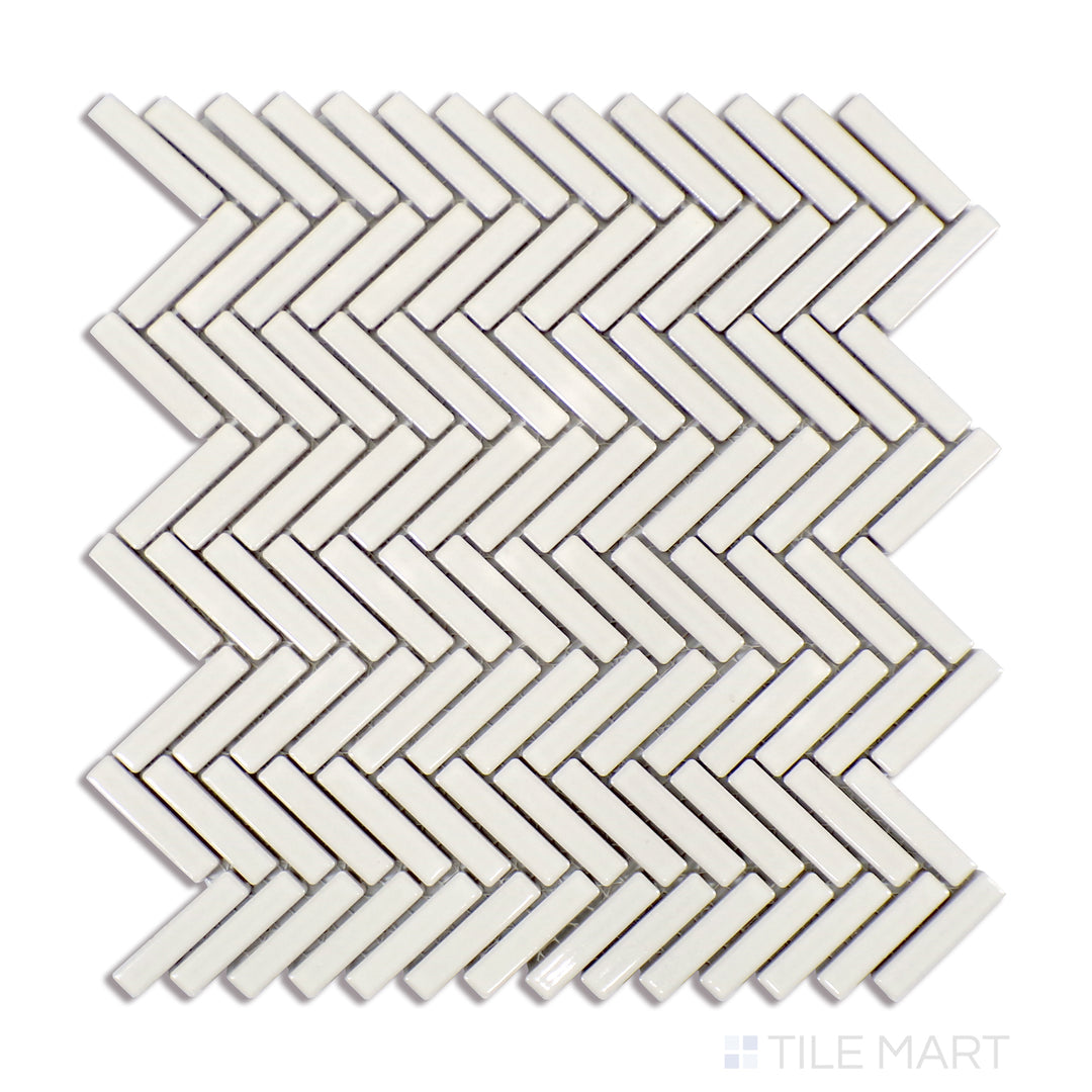 A finely detailed close-up of 90° Off White Herringbone Gloss Glazed Porcelain Mosaic tile reveals its soft off-white tone and luminous glaze, enhancing the classic herringbone design.