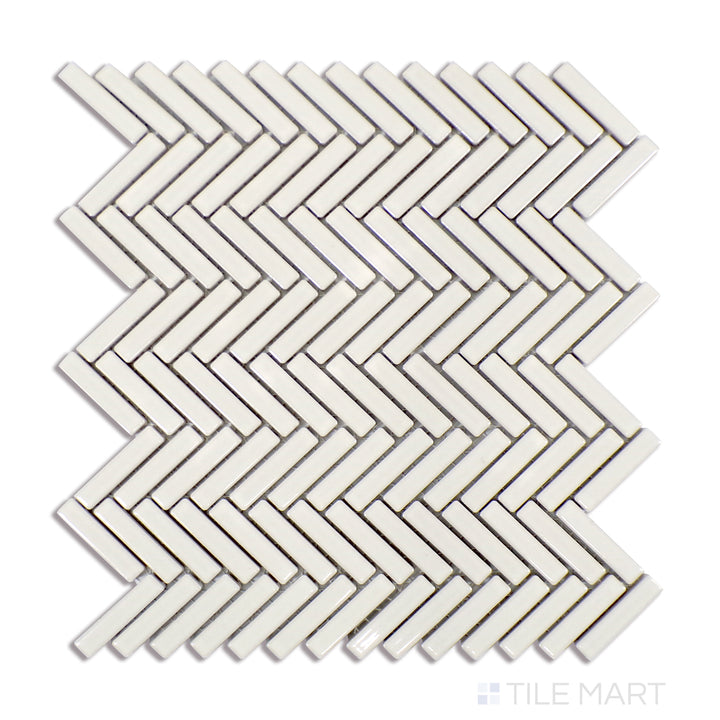 A finely detailed close-up of 90° Off White Herringbone Gloss Glazed Porcelain Mosaic tile reveals its soft off-white tone and luminous glaze, enhancing the classic herringbone design.