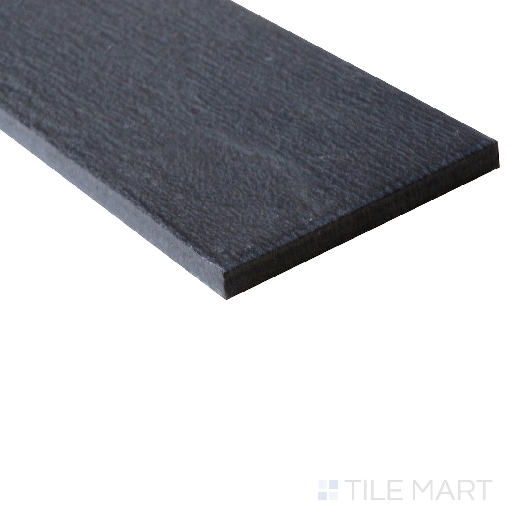 A zoomed-in shot of Allora Black 3X24 Matte Glazed Porcelain tile captures its deep black shade and smooth matte glaze, perfect for modern and bold interiors.