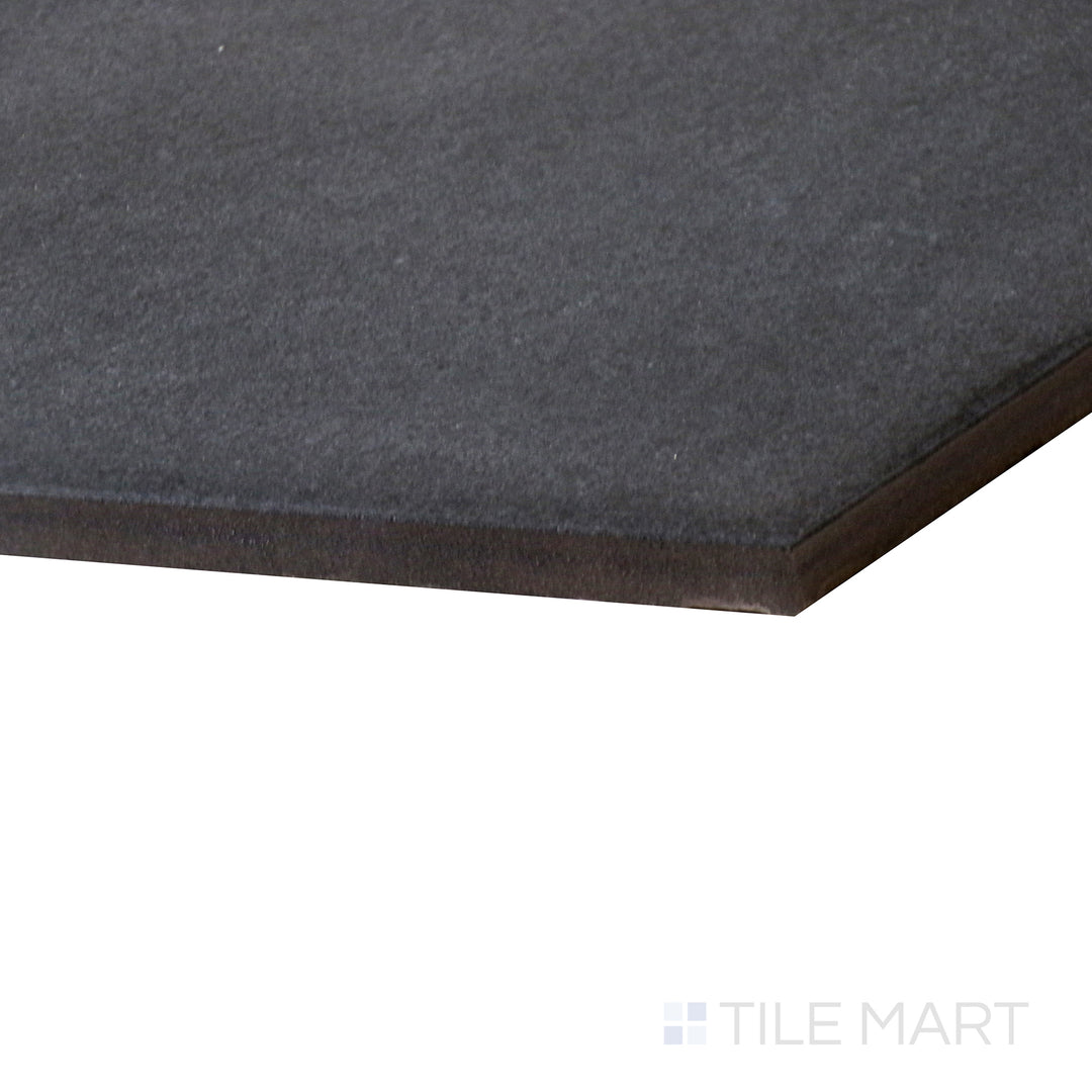 This close-up shot of Allora Black 8.5X10 Matte Glazed Porcelain tile emphasizes its dark, bold finish and smooth matte surface, perfect for dramatic and sophisticated spaces.