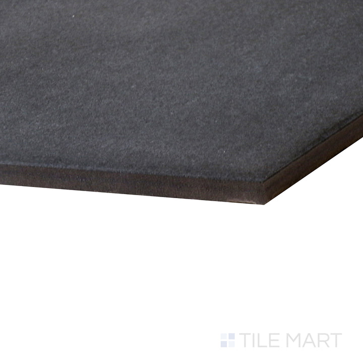 This close-up shot of Allora Black 8.5X10 Matte Glazed Porcelain tile emphasizes its dark, bold finish and smooth matte surface, perfect for dramatic and sophisticated spaces.