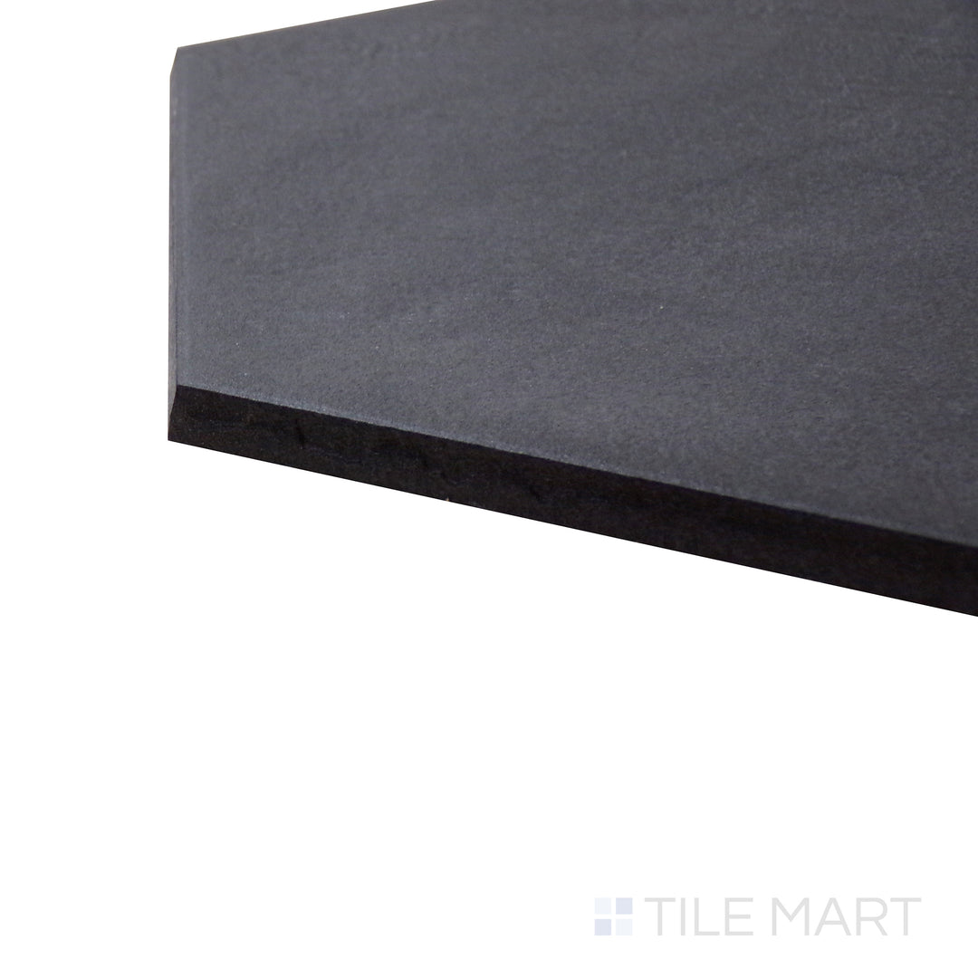 Angled shot of Allora Black 8.5x10 matte glazed porcelain tile, displaying its dark aesthetic, sharp edges, and velvety matte surface creating a seamless transition at the corner.