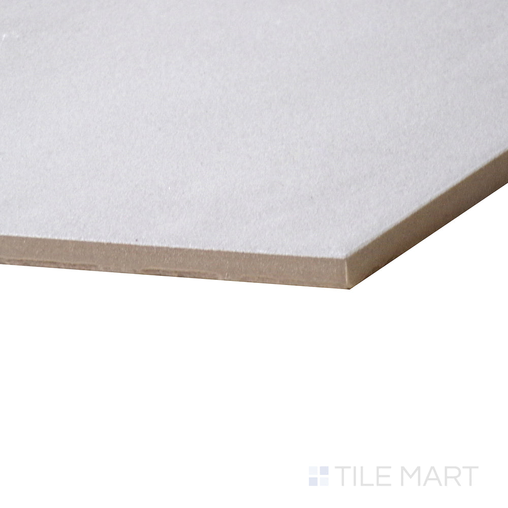 A finely detailed close-up of Allora Grey 8.5X10 Matte Glazed Porcelain tile highlights its neutral gray shade and matte glaze, blending versatility with modern elegance.