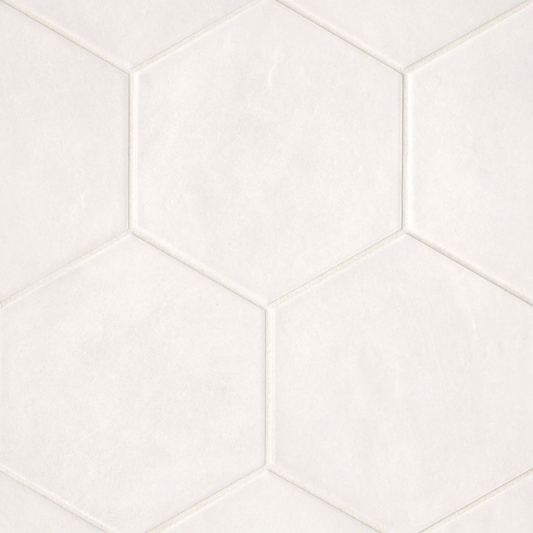From above, the Allora White 8.5x10 matte porcelain tile highlights its pristine white shade, offering a minimalist yet elegant design option.
