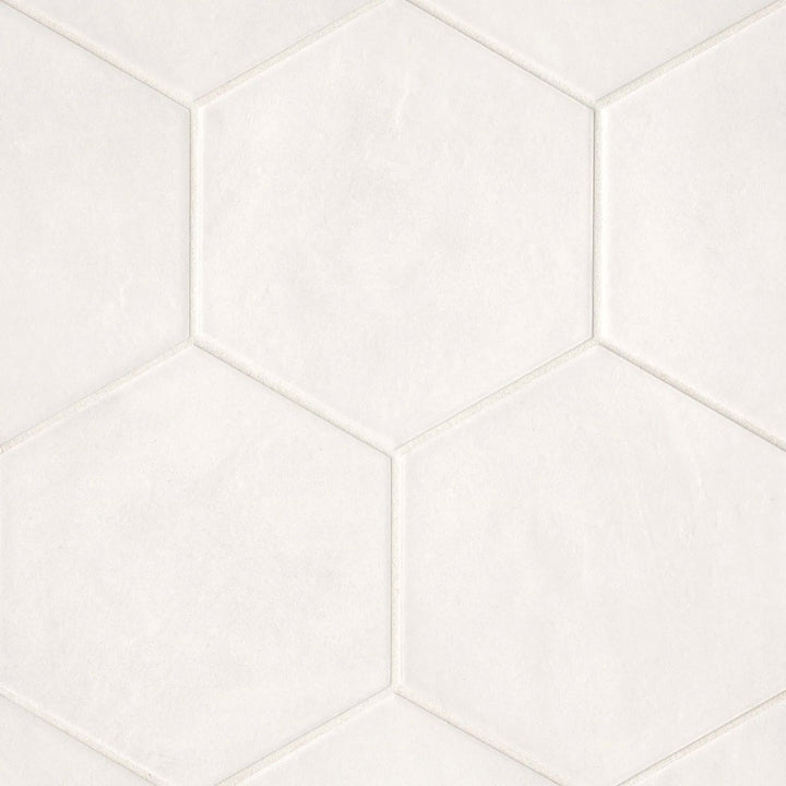 From above, the Allora White 8.5x10 matte porcelain tile highlights its pristine white shade, offering a minimalist yet elegant design option.