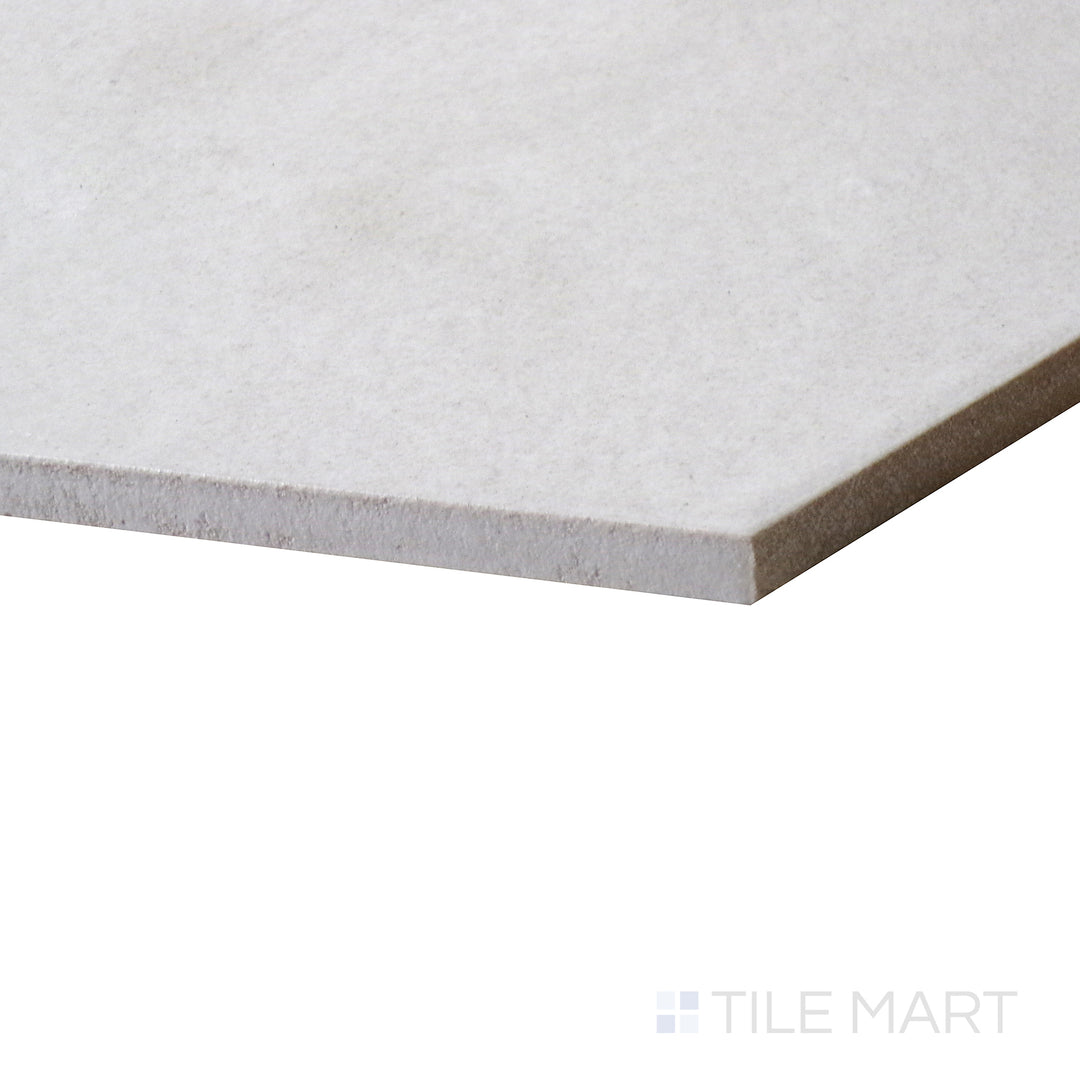 A macro view of Allora White 8.5X10 Matte Glazed Porcelain tile showcases its pristine white hue and soft matte texture, bringing timeless charm to any space.