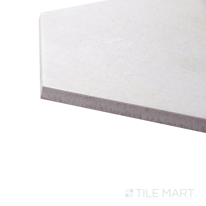 Side-corner view of Allora White 8.5x10 matte glazed porcelain tile, drawing attention to its crisp white tone, finely detailed edges, and soft matte surface.