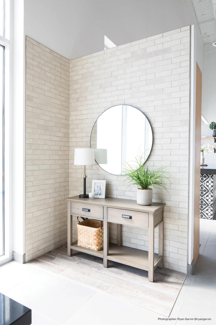 Rustic interior with Avondale Early Gray 2x8 matte brick, adding character and timeless charm.