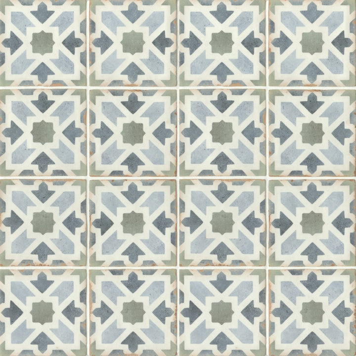 An overhead view of the Casablanca Kenzi 5x5 matte glazed ceramic tile emphasizes its bold yet refined aesthetic, with a smooth matte glaze enhancing its intricate details.
